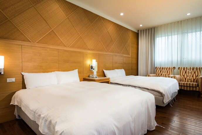 Imagen de la habitación del Hotel Jun Yue Hanging Garden Resort. Foto 25