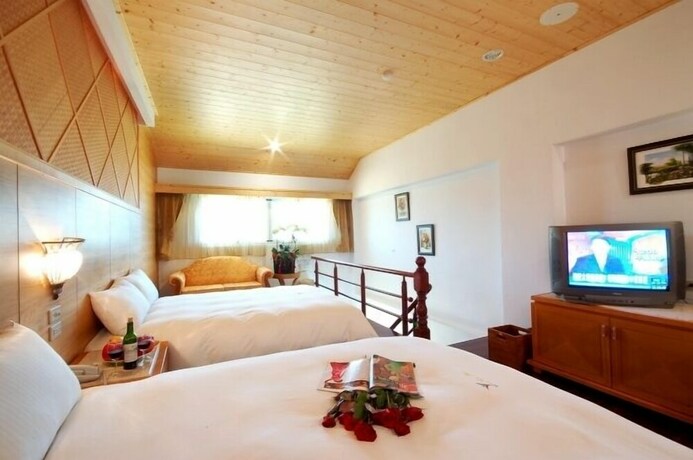 Imagen de la habitación del Hotel Jun Yue Hanging Garden Resort. Foto 29