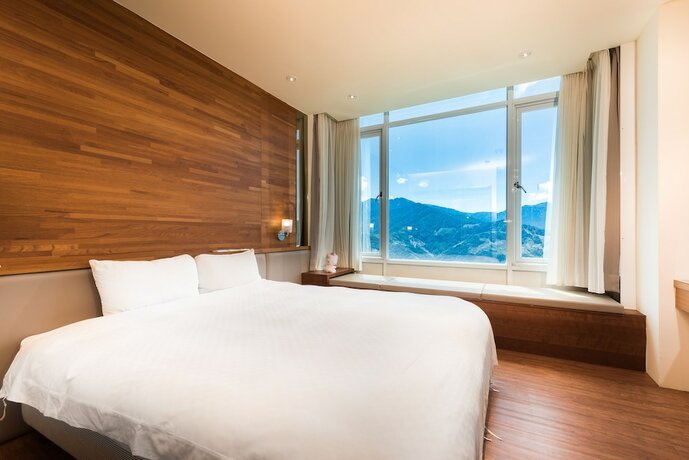 Imagen de la habitación del Hotel Jun Yue Hanging Garden Resort. Foto 35