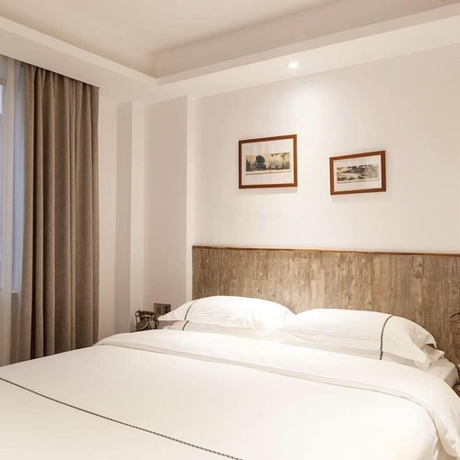 Imagen de la habitación del Hotel Jundiwan Xiamen University. Foto 8