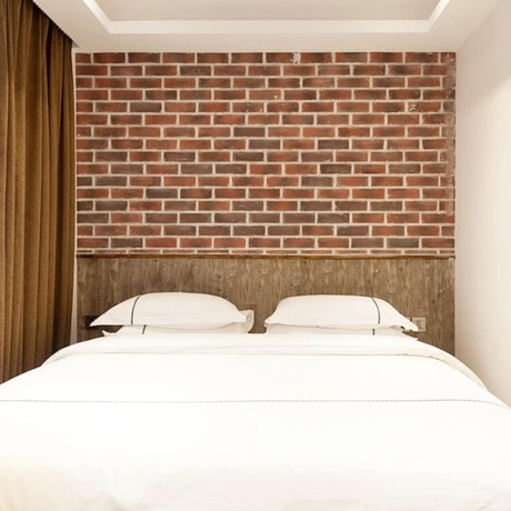 Imagen de la habitación del Hotel Jundiwan Xiamen University. Foto 10