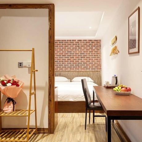 Imagen de la habitación del Hotel Jundiwan Xiamen University. Foto 14