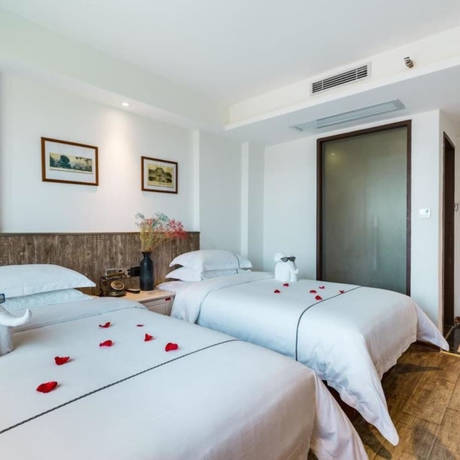 Imagen de la habitación del Hotel Jundiwan Xiamen University. Foto 15