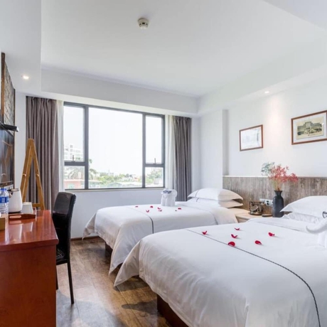 Imagen de la habitación del Hotel Jundiwan Xiamen University. Foto 16