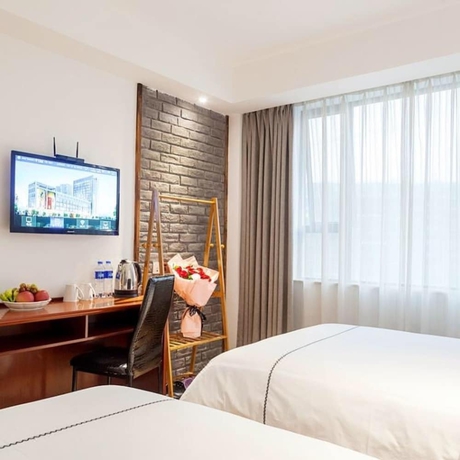 Imagen de la habitación del Hotel Jundiwan Xiamen University. Foto 17