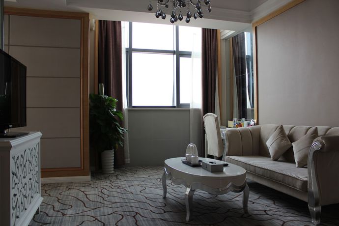 Imagen de la habitación del Hotel Junfu. Foto 7
