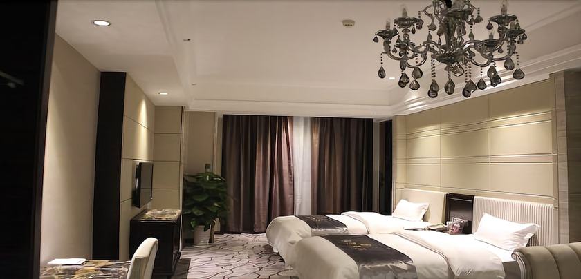 Imagen de la habitación del Hotel Junfu. Foto 11