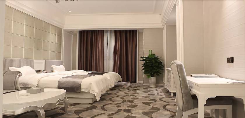 Imagen de la habitación del Hotel Junfu. Foto 12