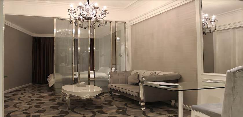 Imagen de la habitación del Hotel Junfu. Foto 13