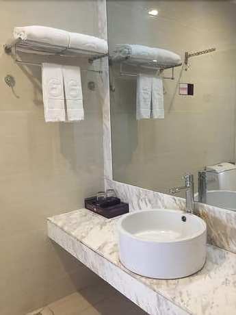 Imagen de la habitación del Hotel Junfu. Foto 14