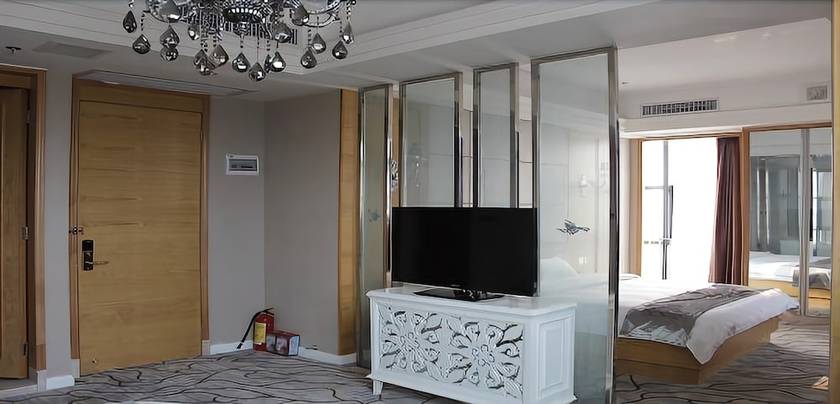 Imagen de la habitación del Hotel Junfu. Foto 15
