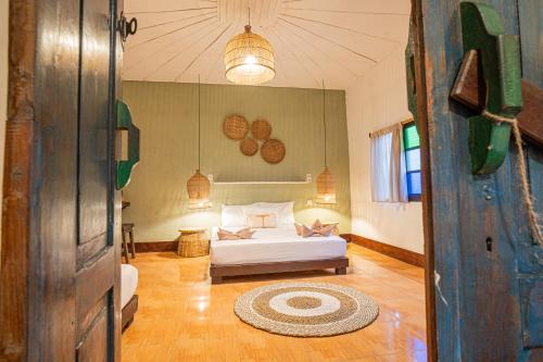 Imagen de la habitación del Hotel Jungalow. Foto 17