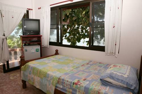 Imagen de la habitación del Hotel Jungle Hut Bungalows &. Foto 14