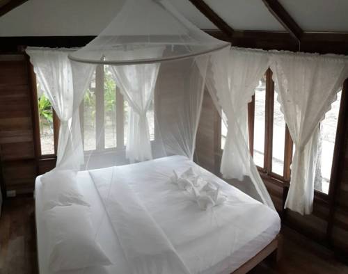 Imagen de la habitación del Hotel Jungle Koh Kood Resort. Foto 11