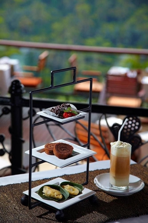 Imagen del bar/restaurante del Hotel Jungle Retreat By Kupu Kupu Barong. Foto 3