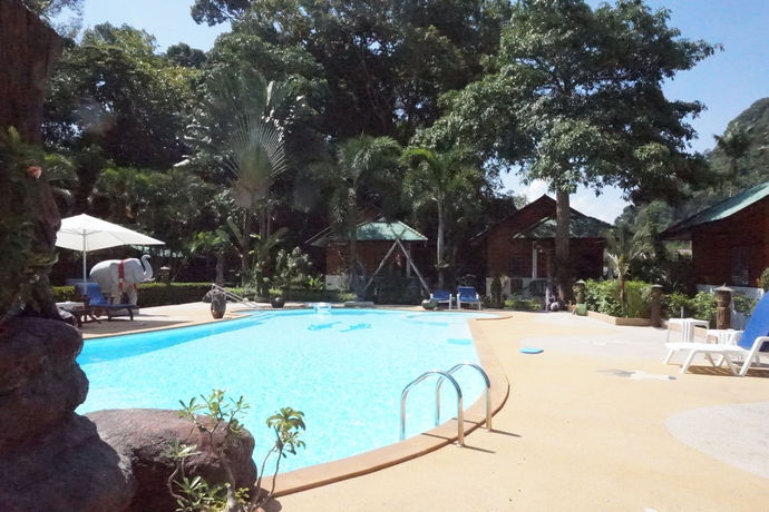 Imagen de los exteriores del Hotel Jungle Village Bungalows. Foto 4