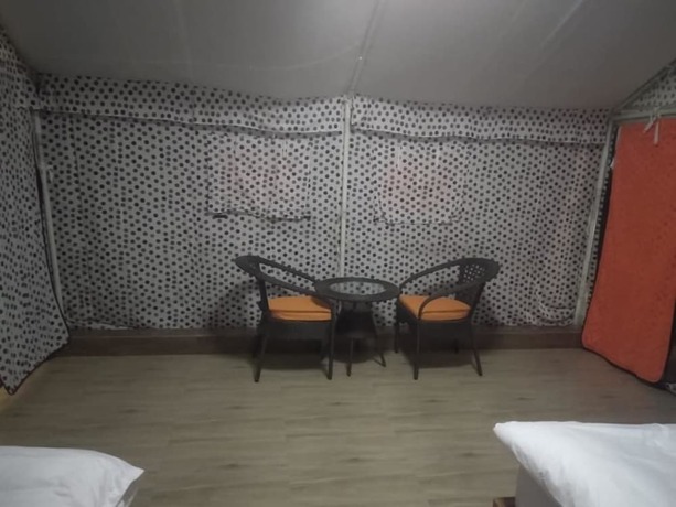 Imagen de la habitación del Hotel Junglee Camps and Resort. Foto 14