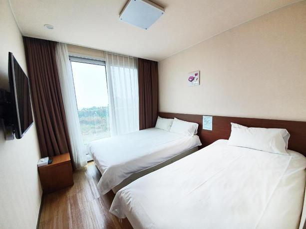Imagen de la habitación del Hotel Jungmun Oceanblue Hotel. Foto 3