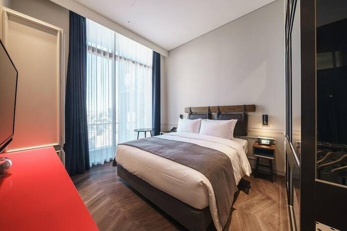 Imagen de la habitación del Hotel Junibino Hongdae. Foto 19