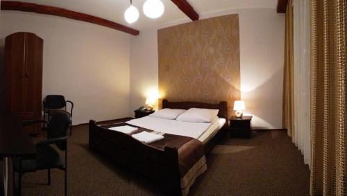Imagen de la habitación del Hotel Junior, Zamość. Foto 6