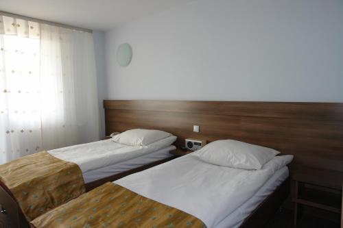 Imagen de la habitación del Hotel Junior, Zamość. Foto 8