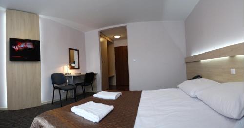 Imagen de la habitación del Hotel Junior, Zamość. Foto 11