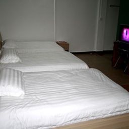 Imagen de la habitación del Hotel Junjia. Foto 6