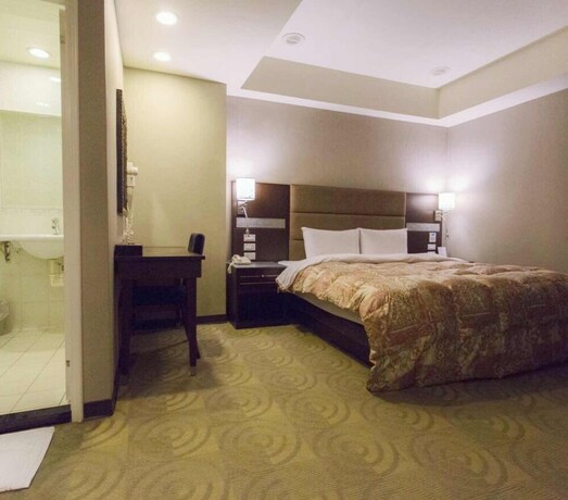 Imagen de la habitación del Hotel Junli. Foto 20