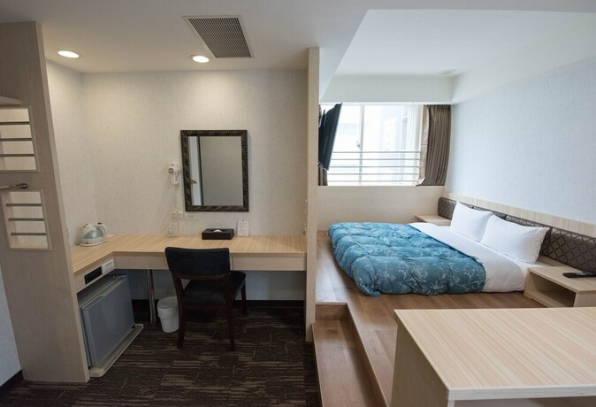 Imagen de la habitación del Hotel Junli. Foto 29