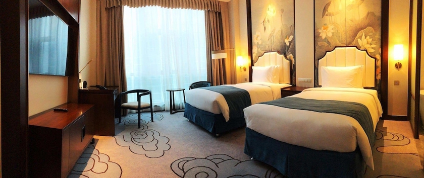 Imagen de la habitación del Hotel Junluxe Meizhou Island Iecc. Foto 6