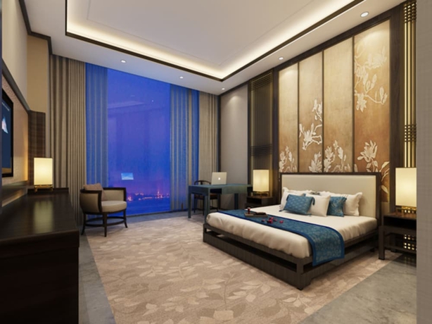Imagen de la habitación del Hotel Junluxe Meizhou Island Iecc. Foto 8