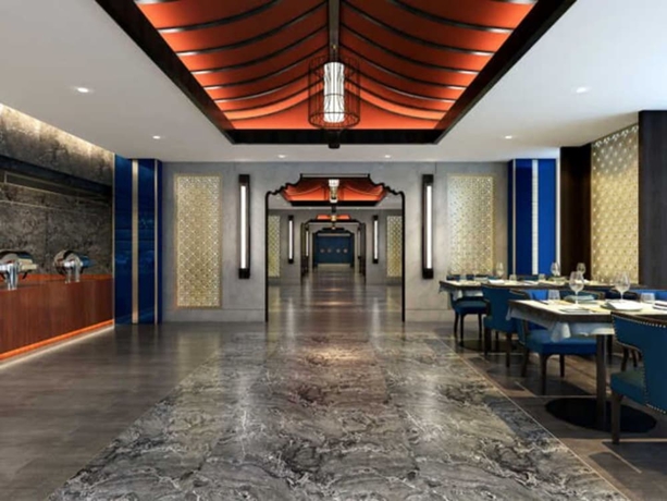 Imagen del bar/restaurante del Hotel Junluxe Meizhou Island Iecc. Foto 3