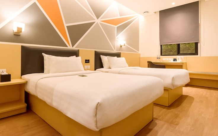 Imagen de la habitación del Hotel Juno Jatinegara Jakarta. Foto 2
