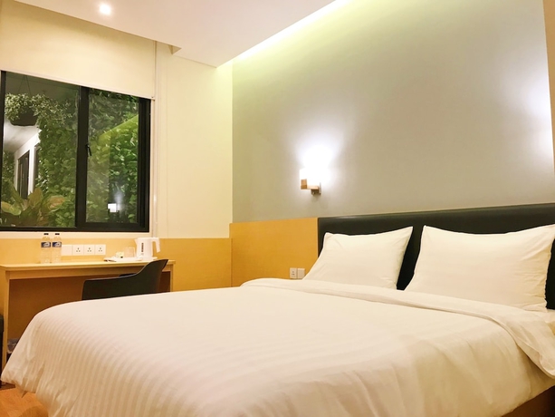 Imagen de la habitación del Hotel Juno Jatinegara Jakarta. Foto 7