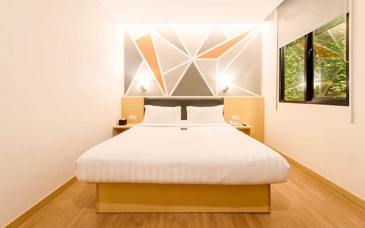 Imagen de la habitación del Hotel Juno Jatinegara Jakarta. Foto 9