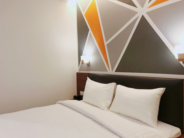 Imagen de la habitación del Hotel Juno Jatinegara Jakarta. Foto 11