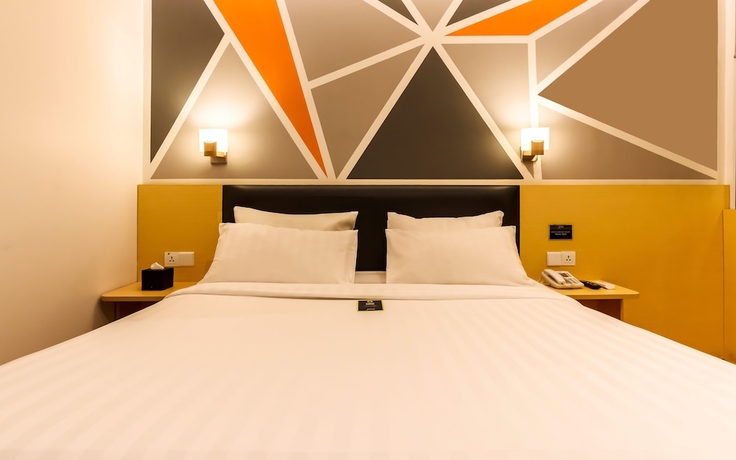 Imagen de la habitación del Hotel Juno Jatinegara Jakarta. Foto 12