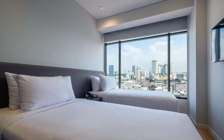 Imagen de la habitación del Hotel Juno Tanah Abang Jakarta. Foto 8