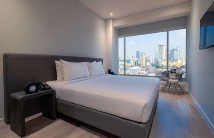 Imagen de la habitación del Hotel Juno Tanah Abang Jakarta. Foto 11