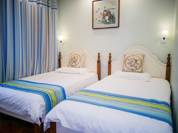 Imagen de la habitación del Hotel Junshe Boutique Guest House - Hostel. Foto 7