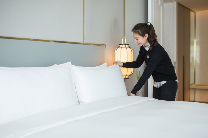 Imagen de la habitación del Hotel Juntels Binjiang Hangzhou. Foto 6