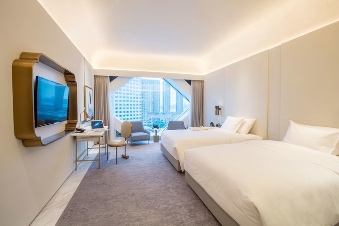Imagen de la habitación del Hotel Juntels Binjiang Hangzhou. Foto 8