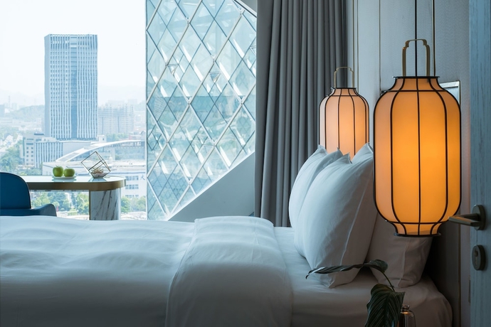 Imagen de la habitación del Hotel Juntels Binjiang Hangzhou. Foto 9
