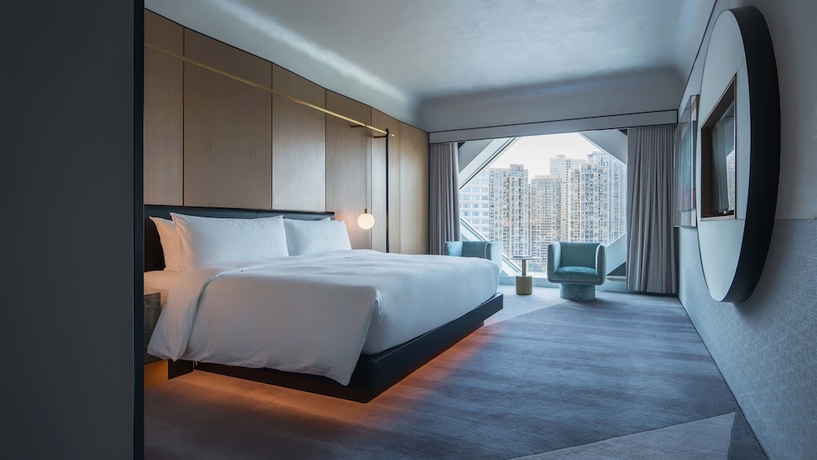 Imagen de la habitación del Hotel Juntels Binjiang Hangzhou. Foto 18