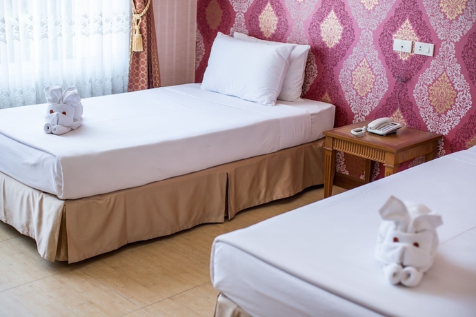 Imagen de la habitación del Hotel Juntra Resort and. Foto 9