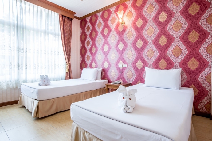 Imagen de la habitación del Hotel Juntra Resort and. Foto 11