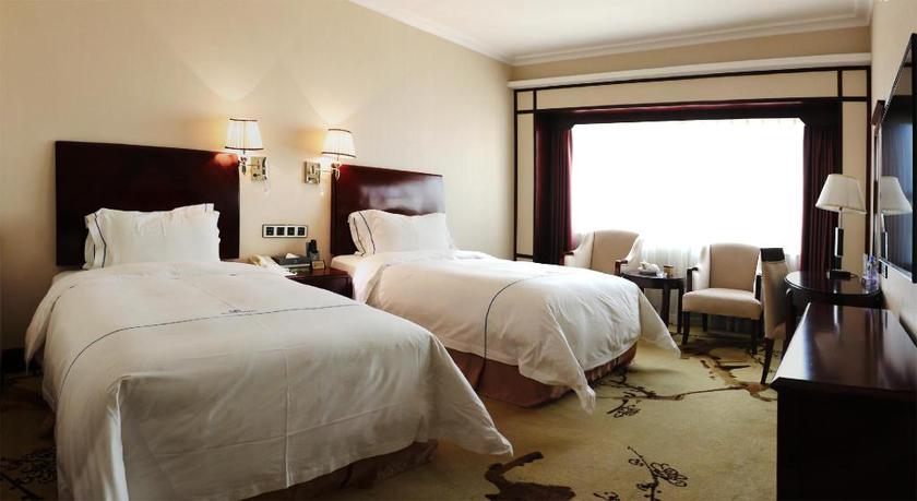 Imagen de la habitación del Hotel Junyi Hotel. Foto 9
