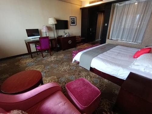 Imagen de la habitación del Hotel Junyi Jinhua Wucheng District Yongkang Street. Foto 11