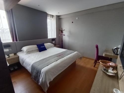 Imagen de la habitación del Hotel Junyi Jinhua Wucheng District Yongkang Street. Foto 12