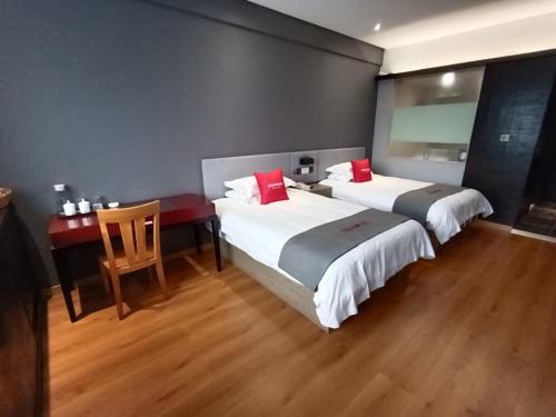 Imagen de la habitación del Hotel Junyi Jinhua Wucheng District Yongkang Street. Foto 13